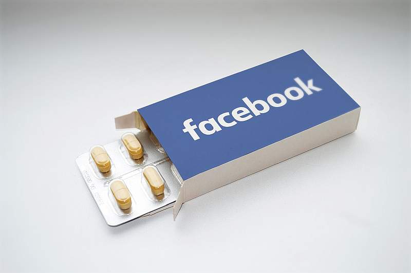 Box with pills labelled Facebook